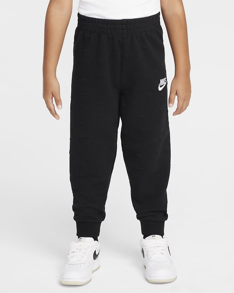 Nike nsw jacquard track pants hotsell